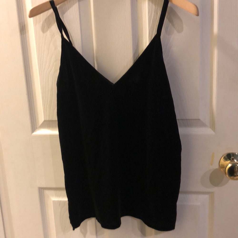 Black going out top
